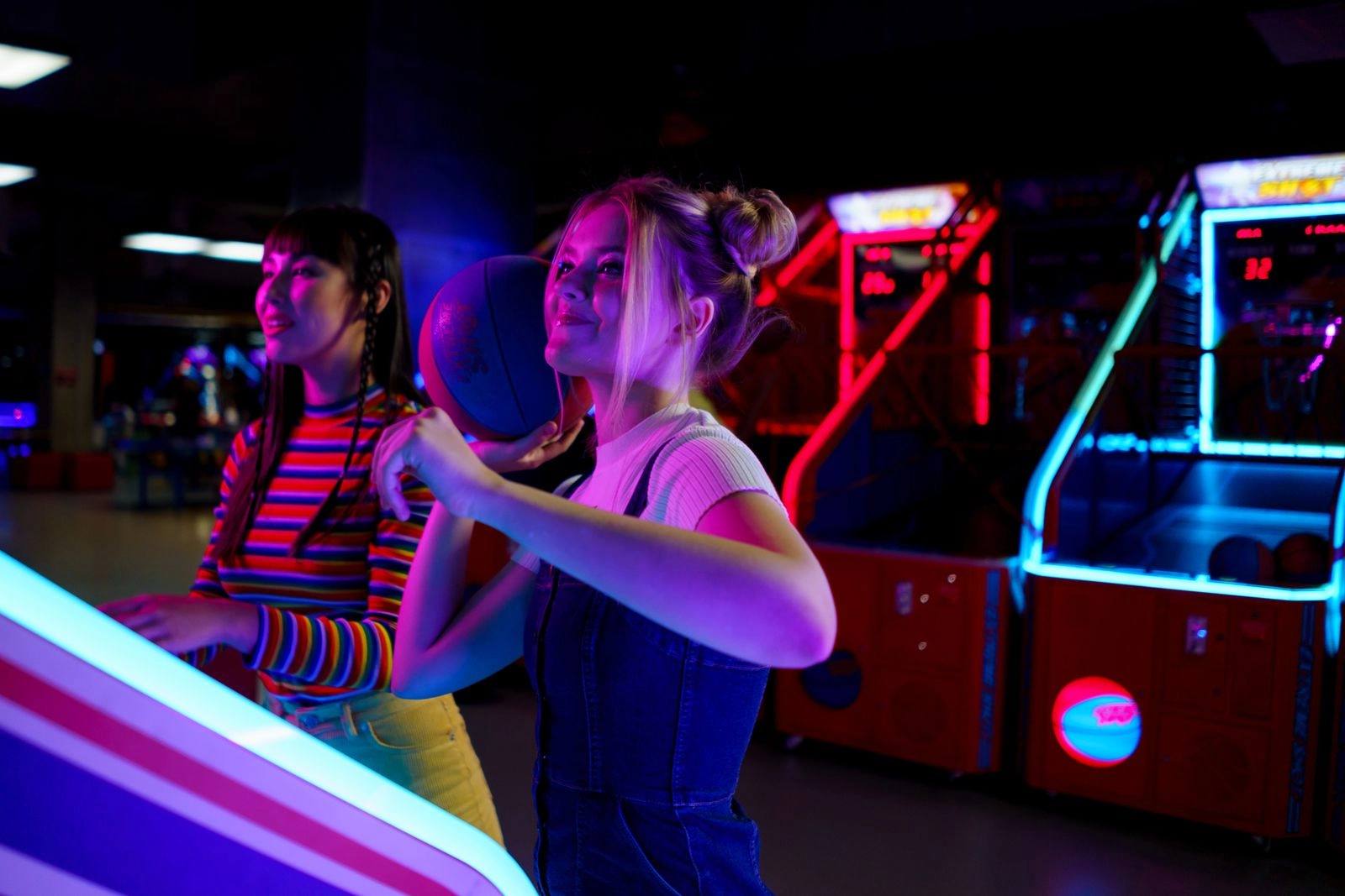 S1_young_women_arcade_basketball