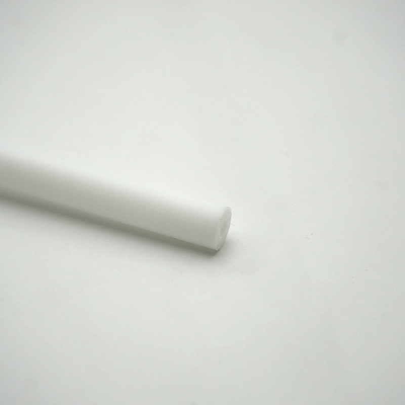 Machined plastic insulator with white PTFE material 3 - Bost