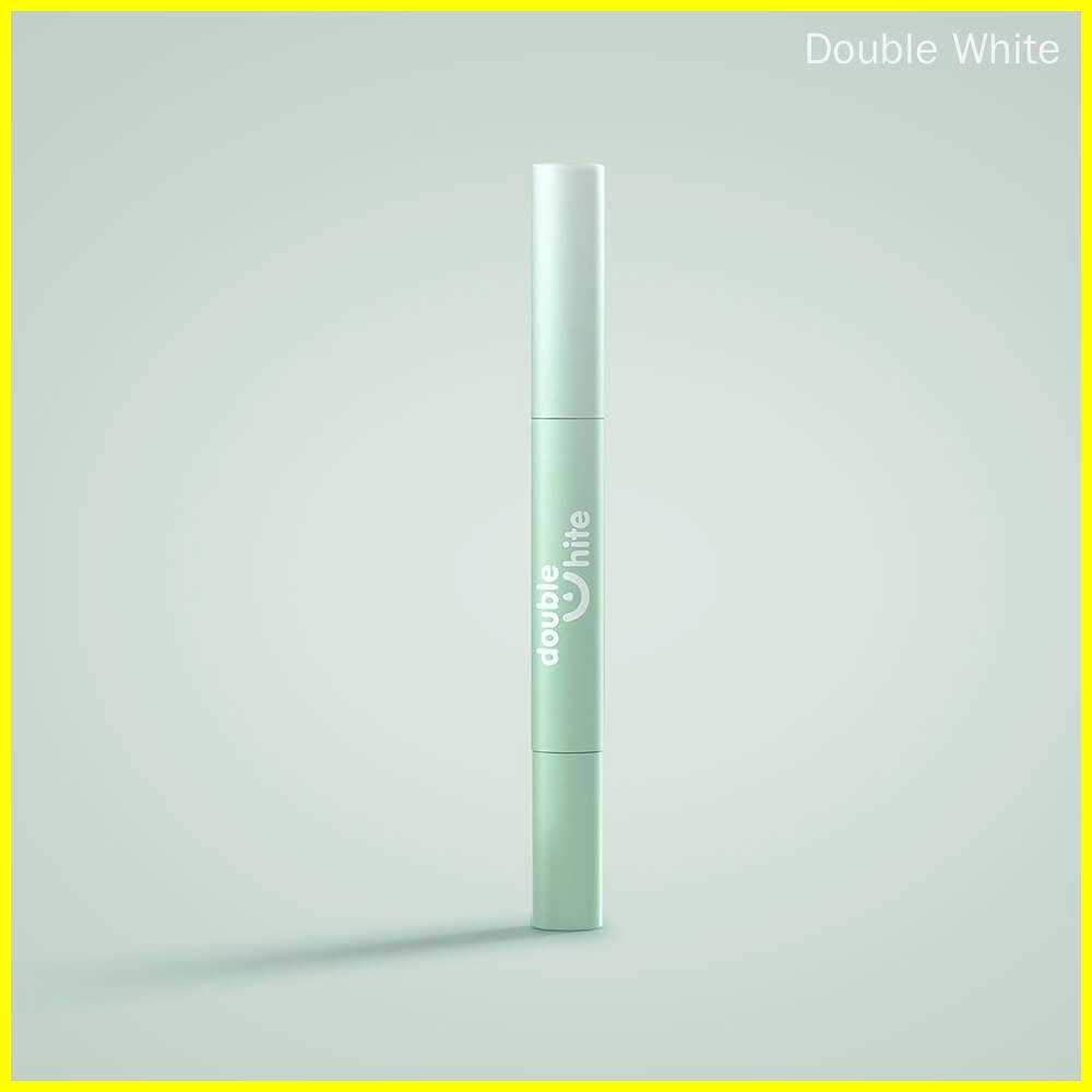 Um tubo verde e branco de gel clareador de dentes Double White. - Double White
