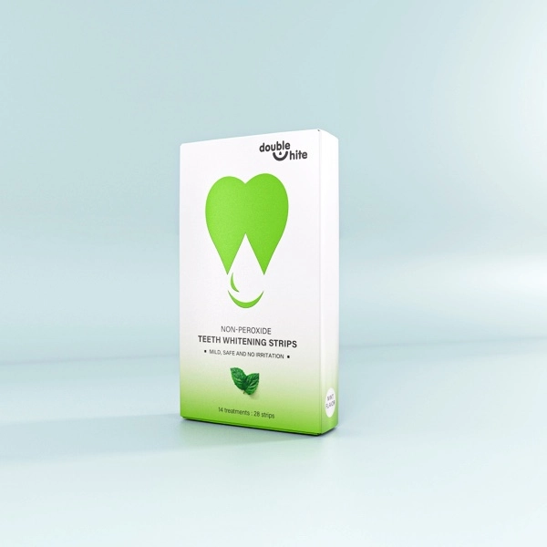 SC-Teeth-Whitening-Gel-Strips-2 A box of Double White non-peroxide teeth whitening strips. The box is white with a green heart-shaped logo and green text.