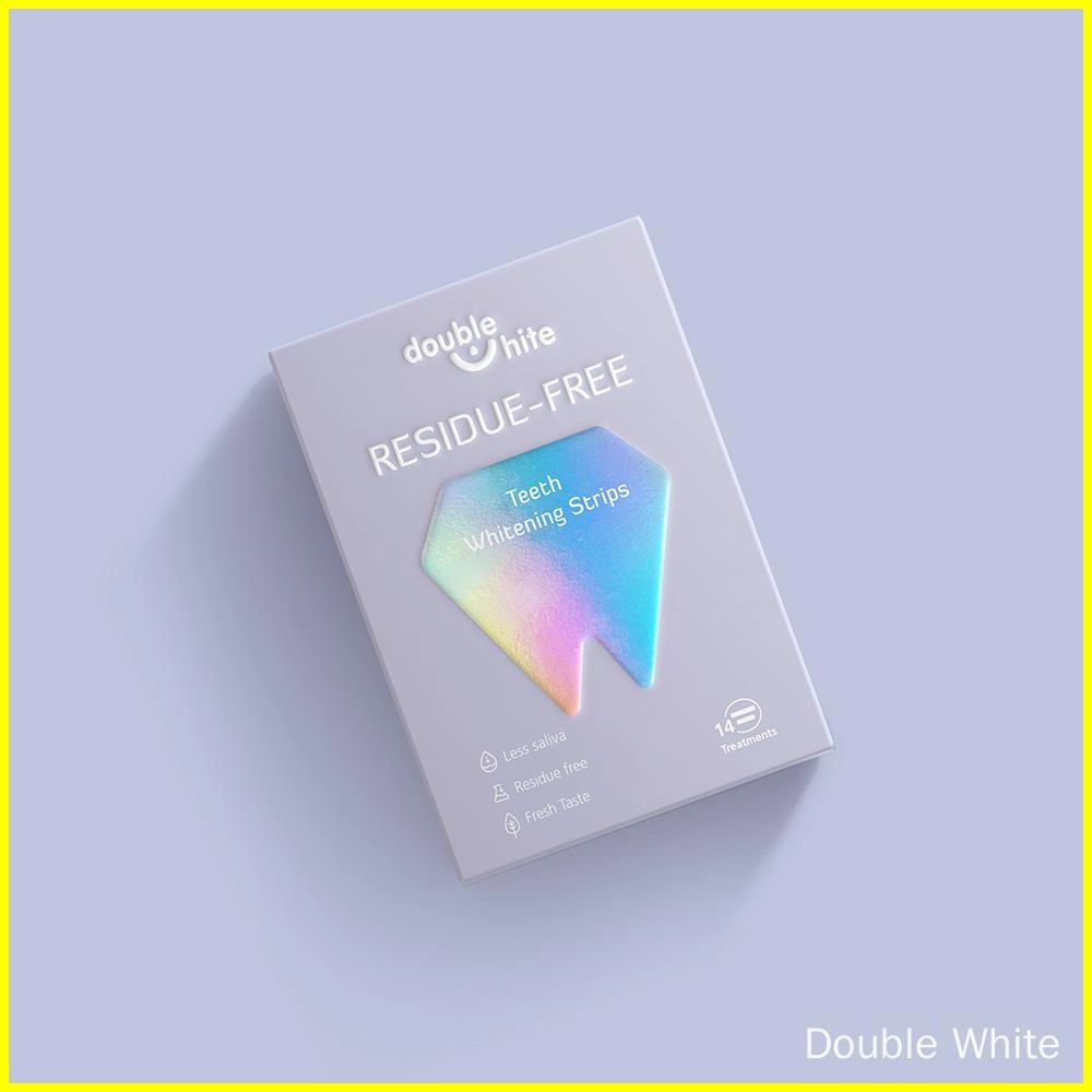 A box of Double White Residue Free Teeth Whitening Strips. The box is white with a blue and purple gradient diamond on the front.