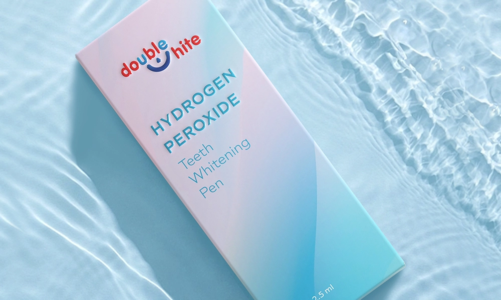 Une boîte de stylo de blanchiment des dents au peroxyde d&#39;hydrogène Double White.