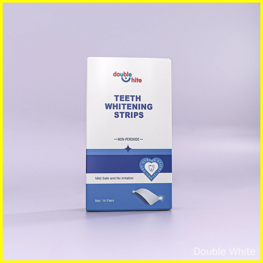 A white box of Double White teeth whitening strips. The box has a blue strip on the front with the words "double white" and "teeth whitening strips" in white text.