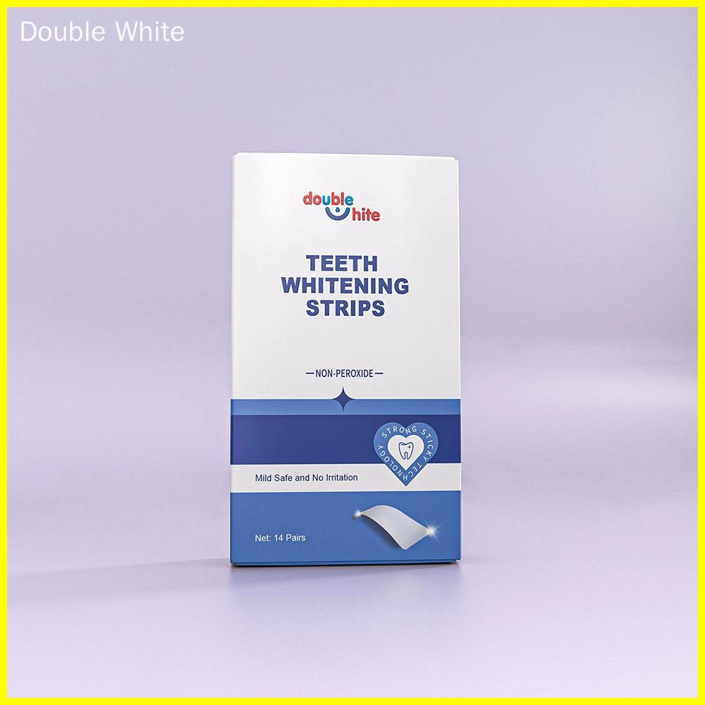 A white box of Double White teeth whitening strips. The box has a blue strip on the front with the words "double white" and "teeth whitening strips" in white text.