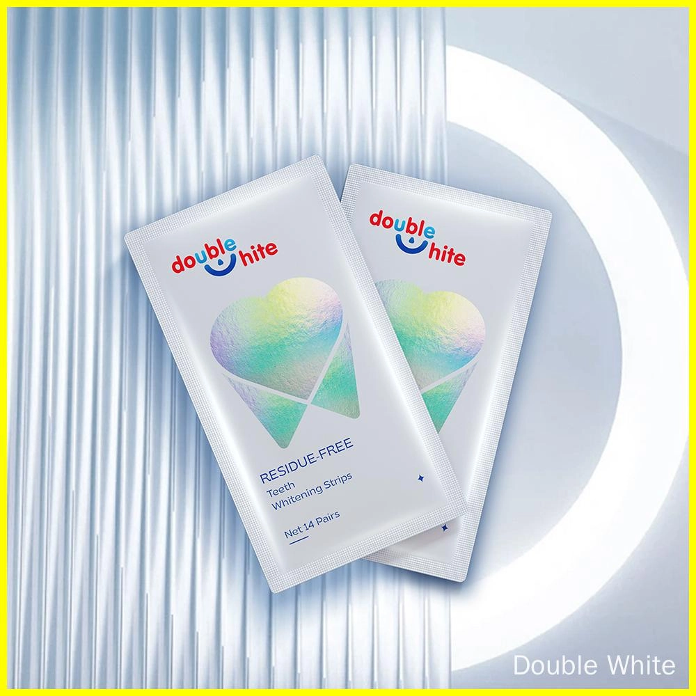 Две коробки полосок для отбеливания зубов Double White Residue-Free по 14 пар в упаковке.