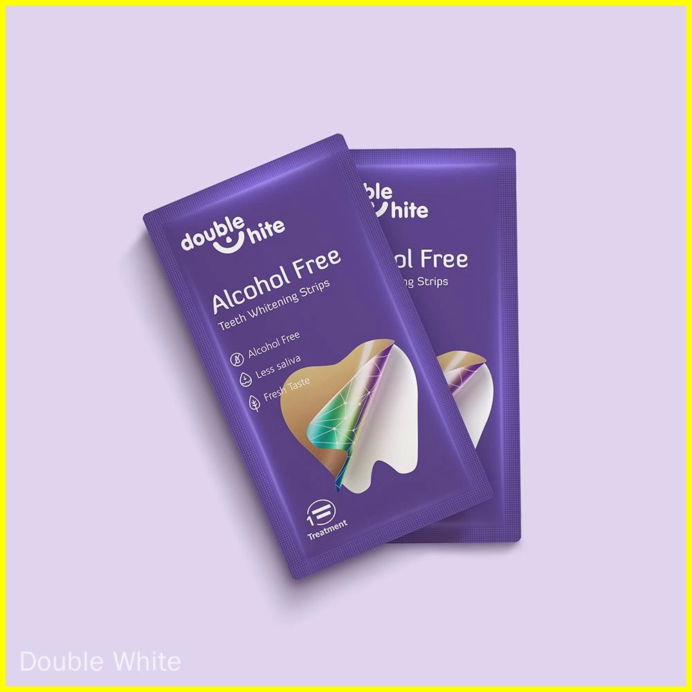 Une boîte violette et blanche de bandelettes blanchissantes pour les dents Double White.