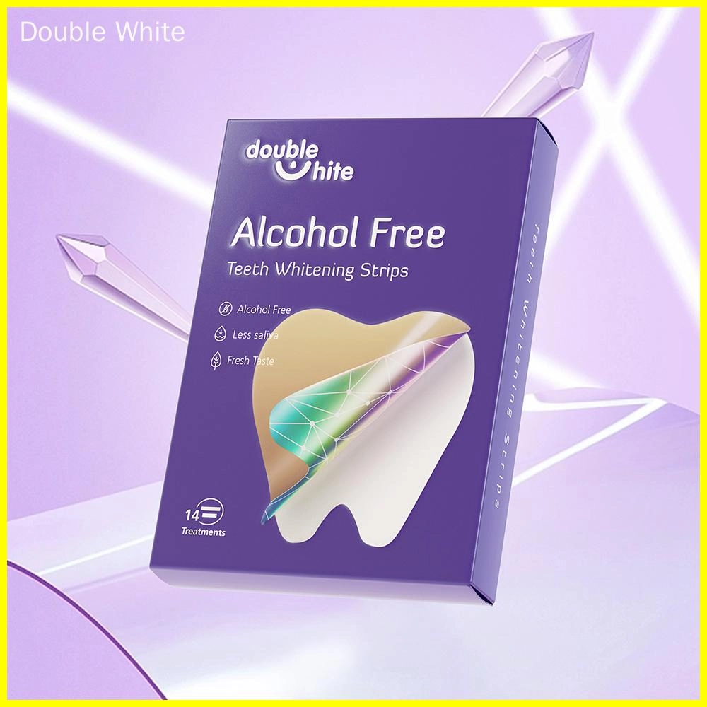 Uma caixa roxa e branca de Double White Alcohol-Free Teeth Whitening Strips. A caixa tem uma janela transparente na frente para que você possa ver as tiras dentro. Há 14 tratamentos em cada caixa.
