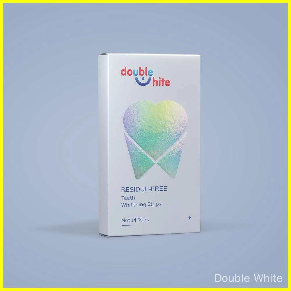 Una caja de tiras blanqueadoras de dientes Double White. La caja es blanca con un diente degradado en azul y rosa en el frente. El texto en la caja dice &quot;double white&quot;, &quot;residue-free&quot;, &quot;teeth whitening strips&quot; y &quot;net 14 pairs&quot;.