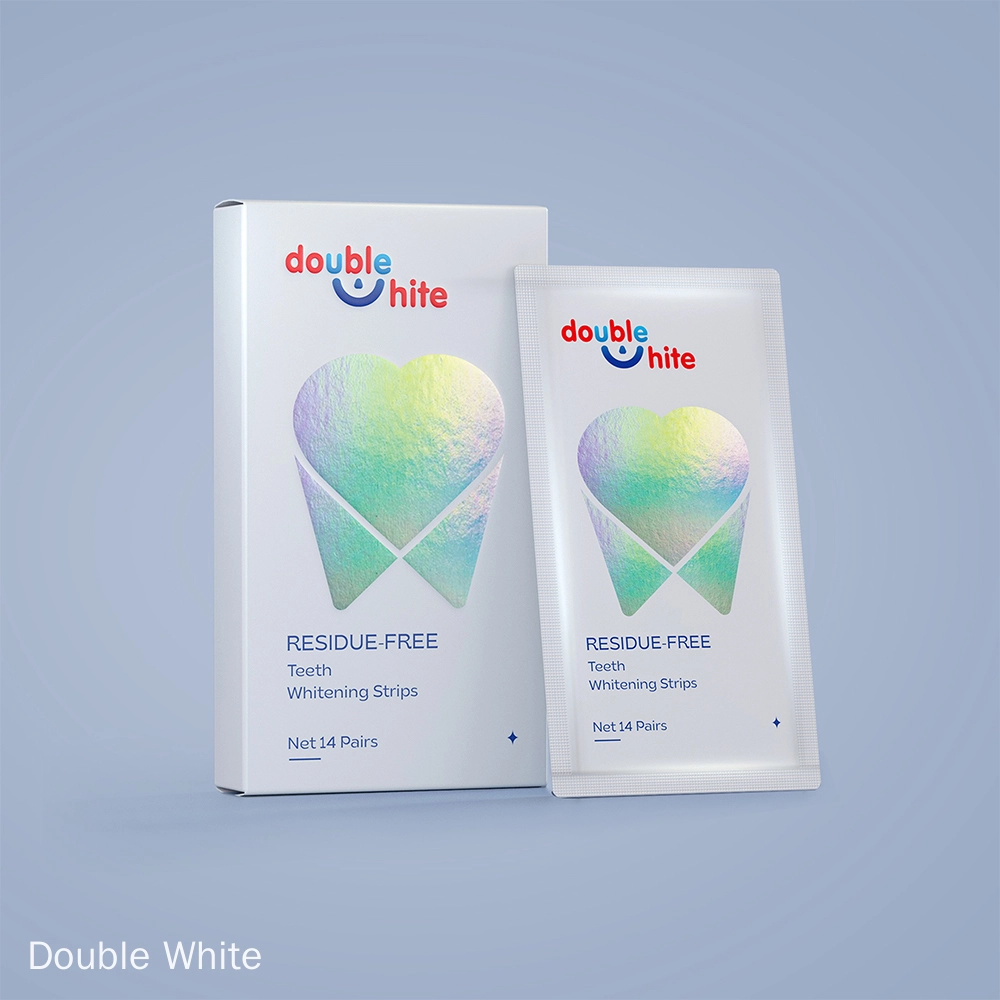 A box and a packet of Double White Residue Free Teeth Whitening Strips. - Double White
