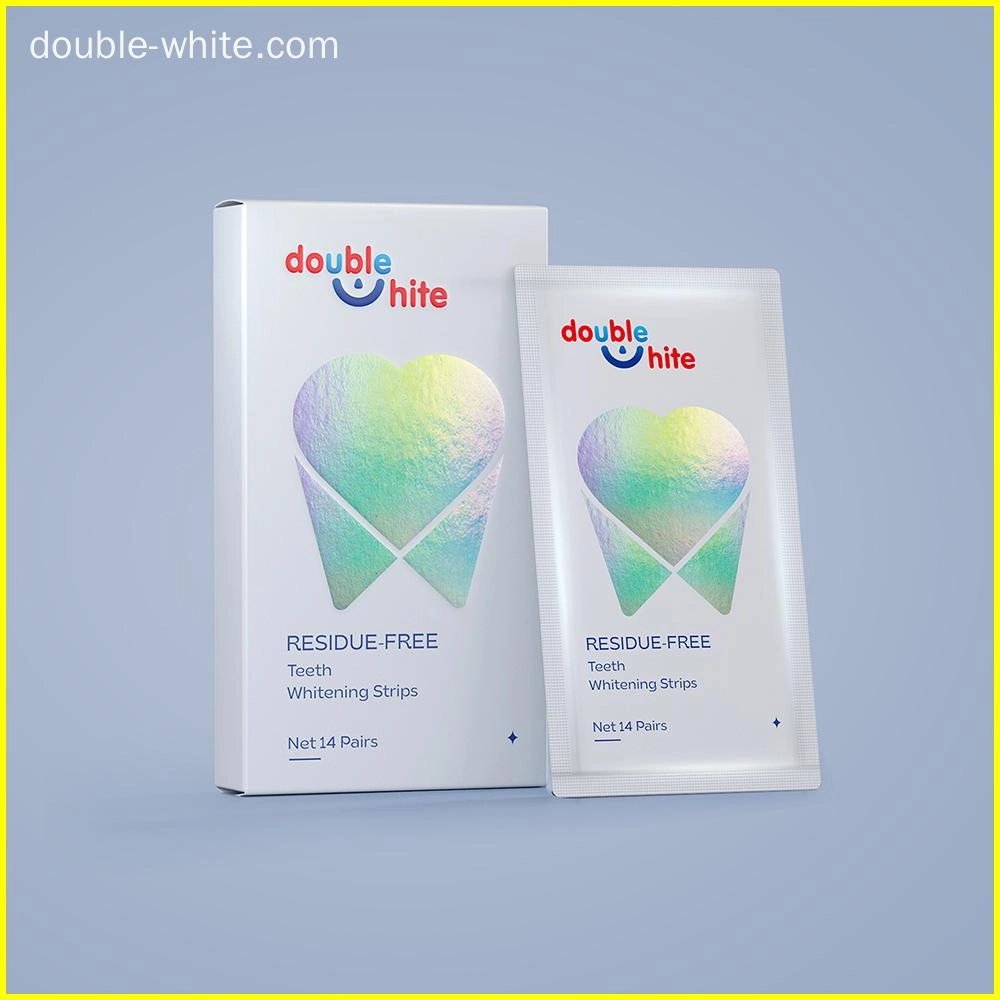 A box and a packet of Double White Residue Free Teeth Whitening Strips. - Double White