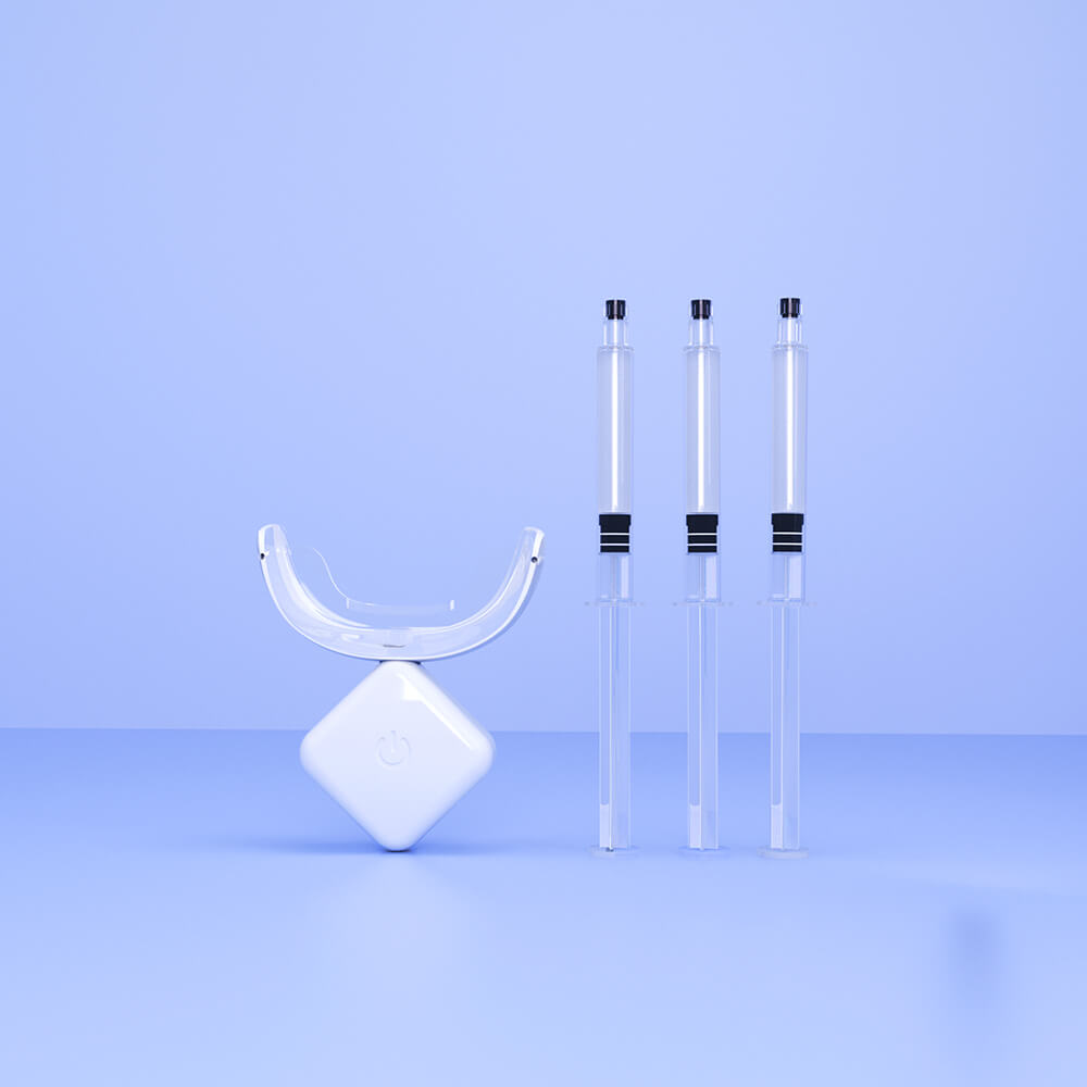 Three whitening gel syringes and a teeth whitening LED light on a blue background.