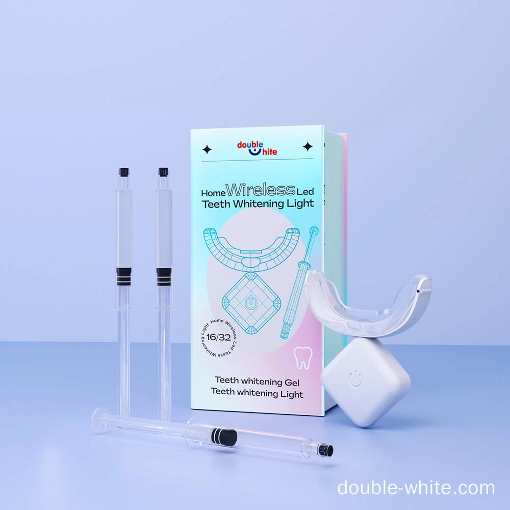 A teeth whitening kit that includes a wireless LED light, two syringes of teeth whitening gel, and a teeth whitening mouth tray.