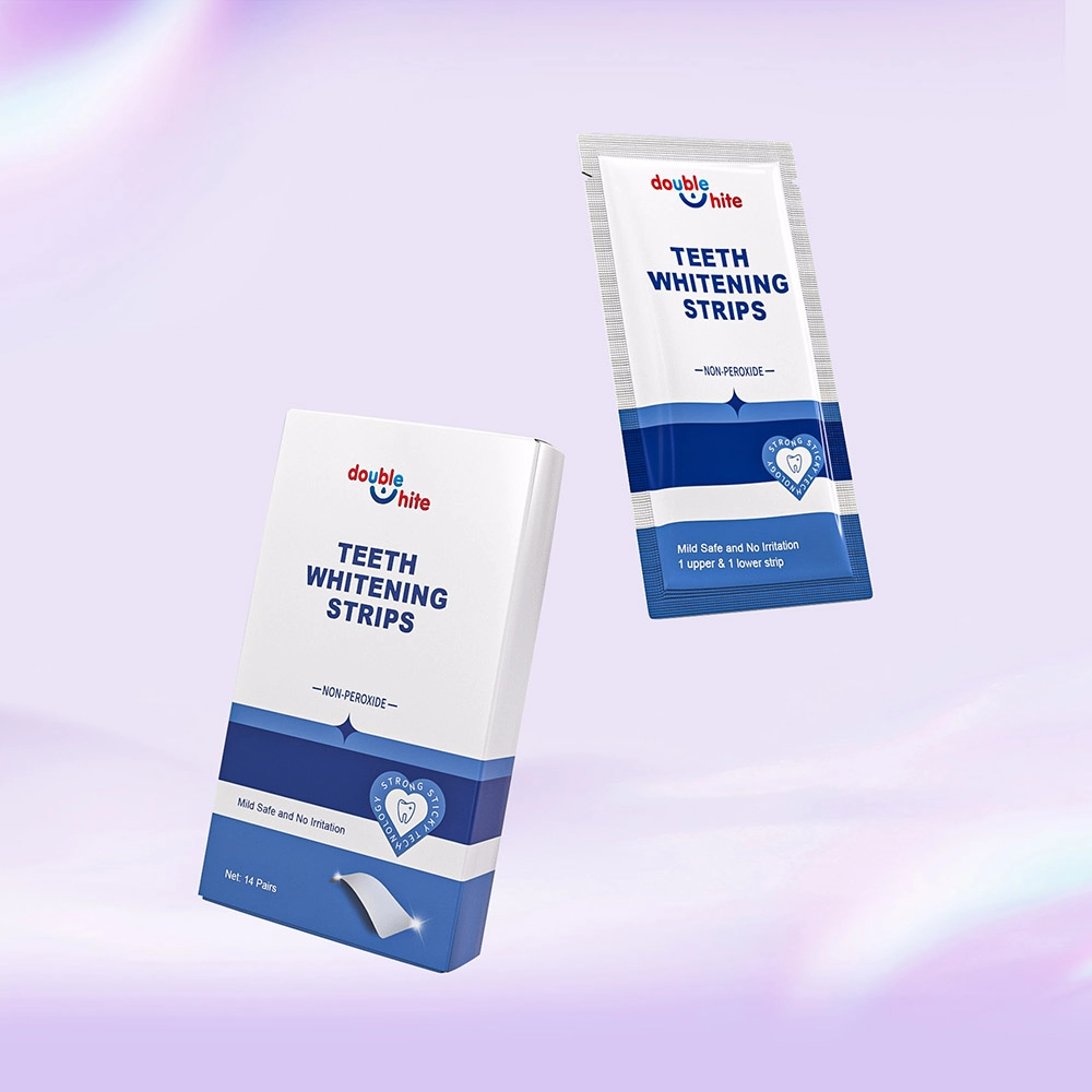 A box and a pack of Double White teeth whitening strips. The box is white with blue and purple accents, and the pack is blue with white accents. The pack has a tear-away top for easy opening.