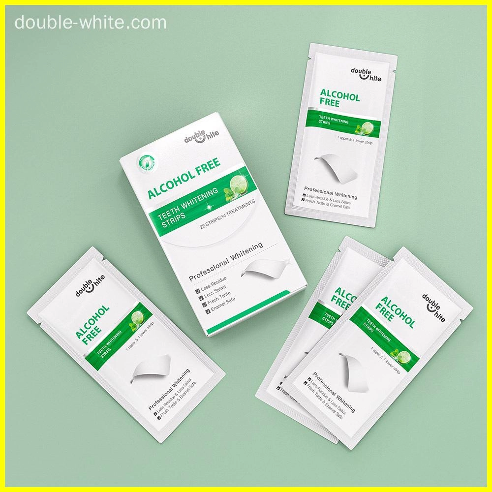 bandes-de-blanchiment-des-dents-qui-font-mal-aux-dents Une boîte de bandes de blanchiment des dents Double White. La boîte contient 28 bandes, soit 14 traitements. Les bandes sont sans alcool et ont une saveur de menthe fraîche. Elles produisent également moins de résidus, moins de salive et sont sans danger pour l'émail.