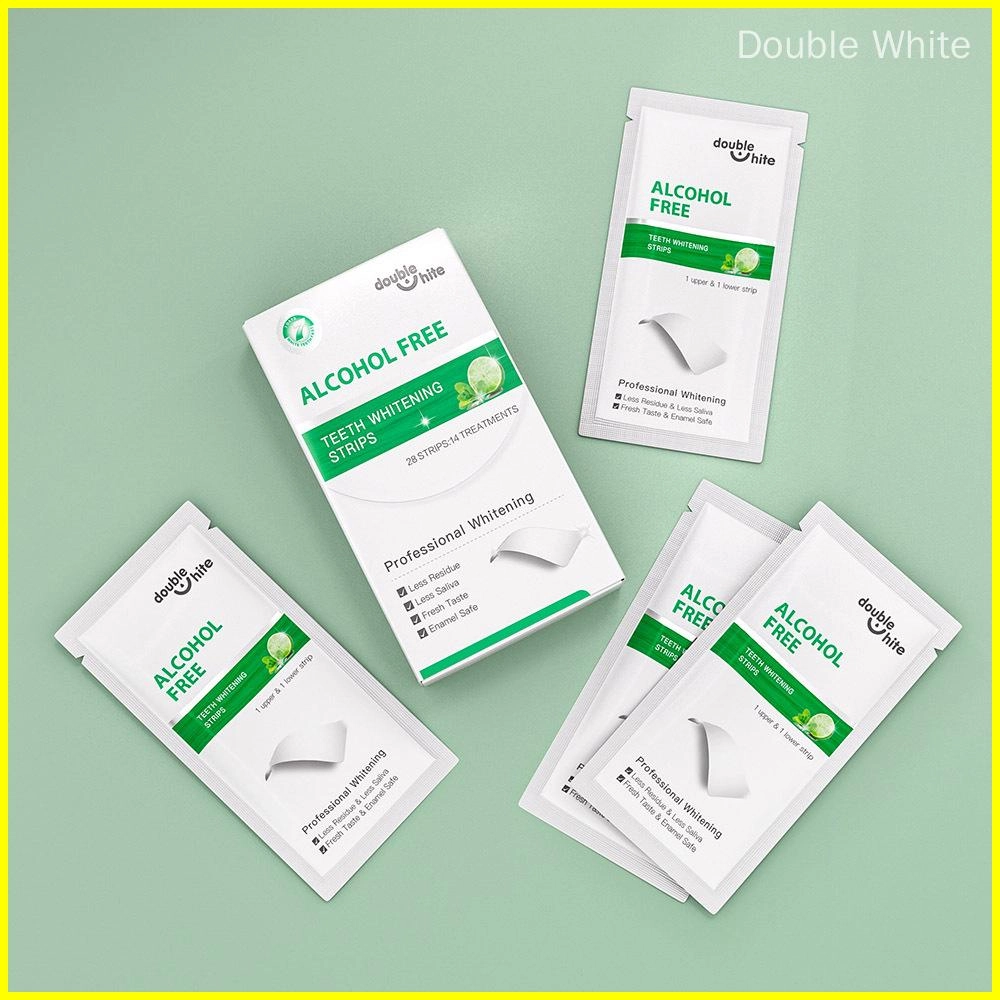bandes-de-blanchiment-des-dents-qui-font-mal-aux-dents Une boîte de bandes de blanchiment des dents Double White. La boîte contient 28 bandes, soit 14 traitements. Les bandes sont sans alcool et ont une saveur de menthe fraîche. Elles produisent également moins de résidus, moins de salive et sont sans danger pour l'émail.