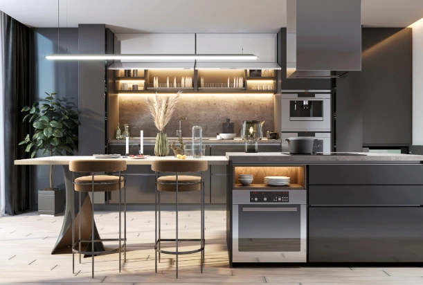 Modern dark grey kitchen with an island, bar stools, and warm under-cabinet lighting.