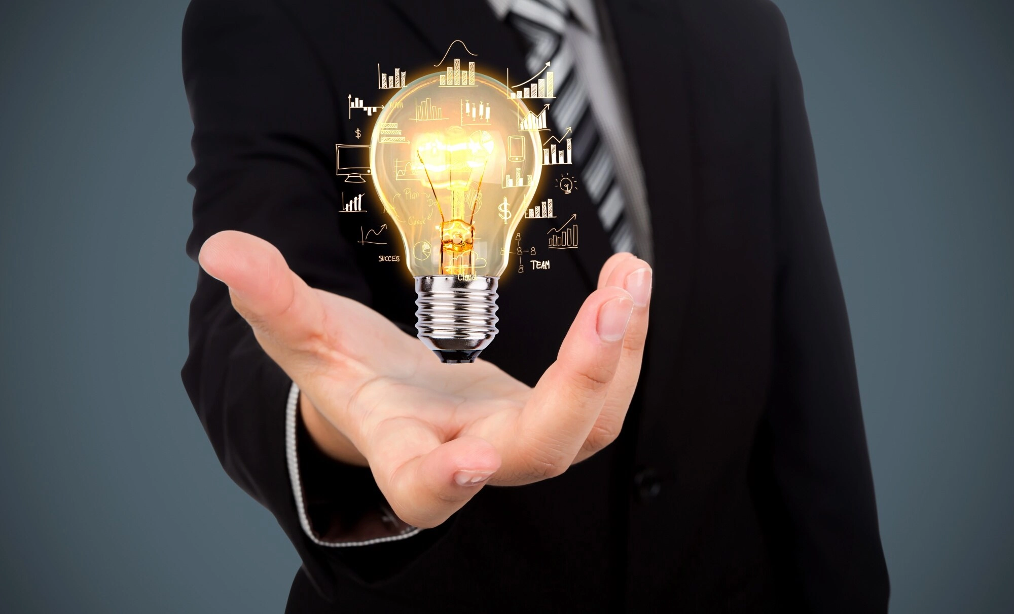 businessman-with-light-bulb-his-hand_1232-891 businessman-with-light-bulb-his-hand_1232-891