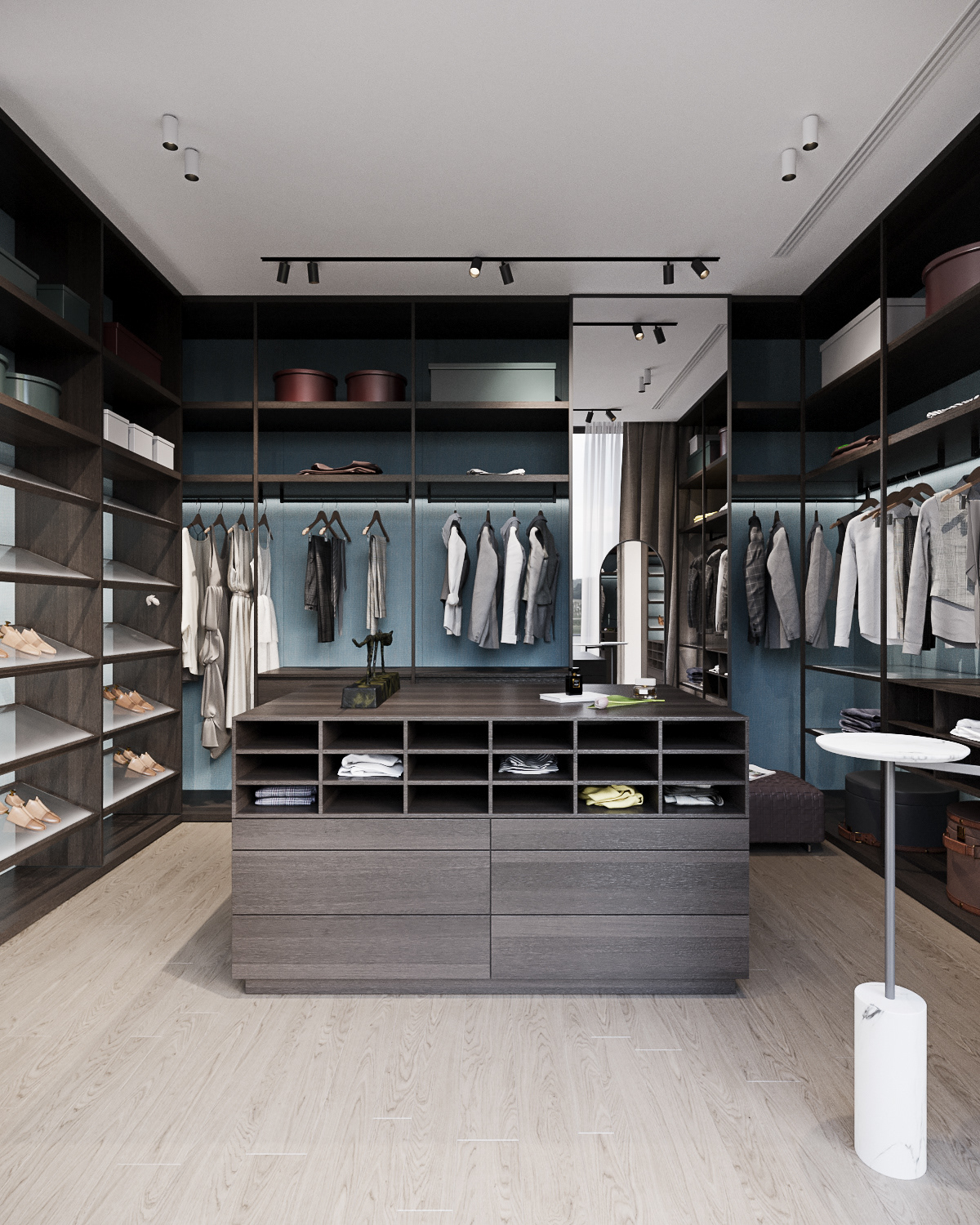 Spacious walk-in closet with custom shelving and a central island unit. Spacious walk-in closet with custom shelving and a central island unit.