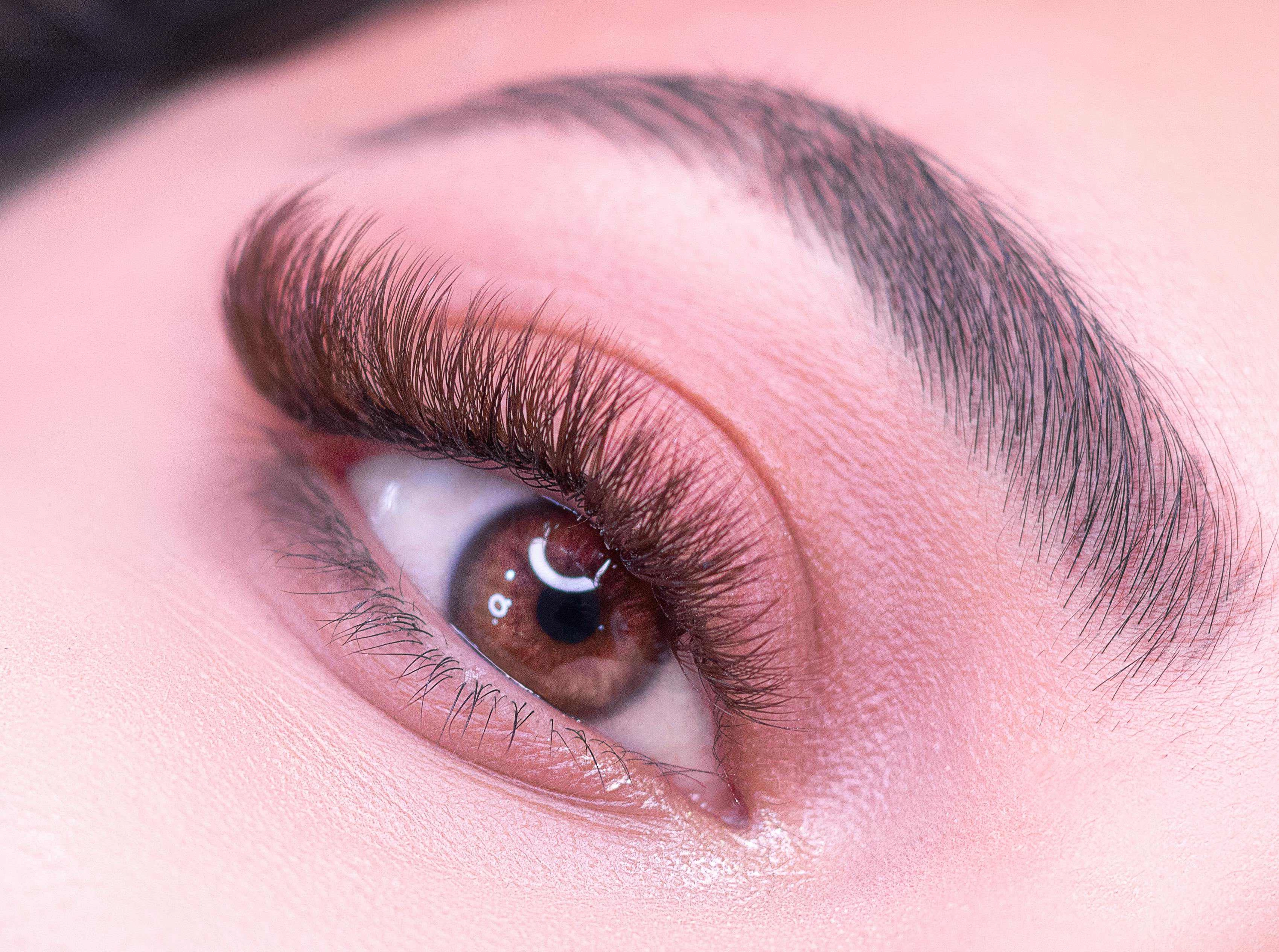 a-woman's-eye-highlighting-eyelashes-and-eyebrow Detailed close-up of a woman's eye highlighting eyelashes and eyebrow_ (1)