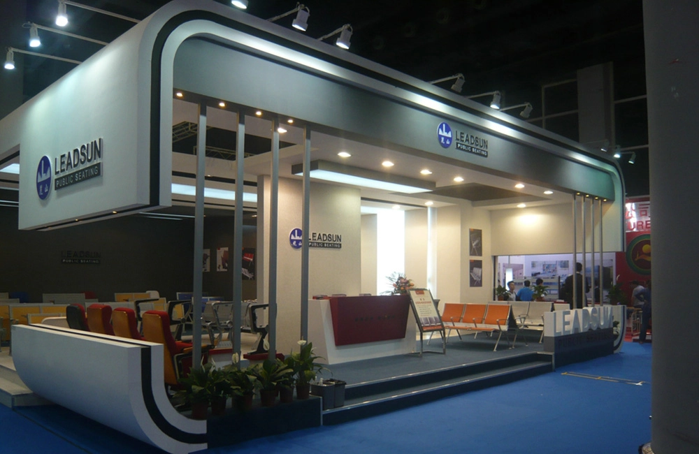 Leadsun-team-interacting-with-visitors A modern, well-lit trade show booth for Leadsun Public Seating