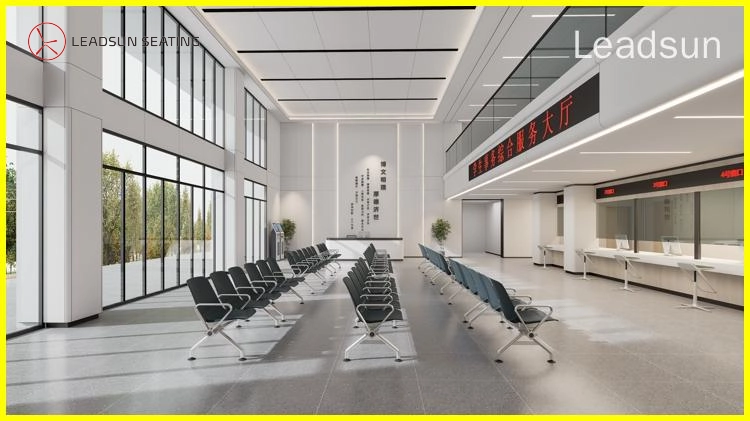 commercial-waiting-benches Modern, spacious government office lobby with rows of waiting chairs, large windows, and a service counter.
