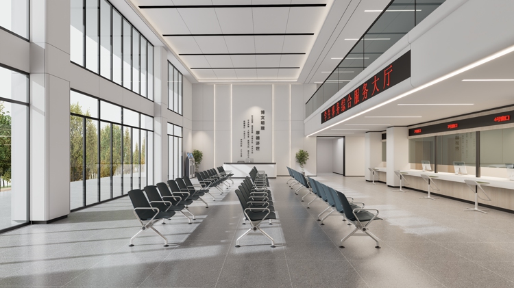Modern, spacious government office lobby with rows of waiting chairs, large windows, and a service counter.