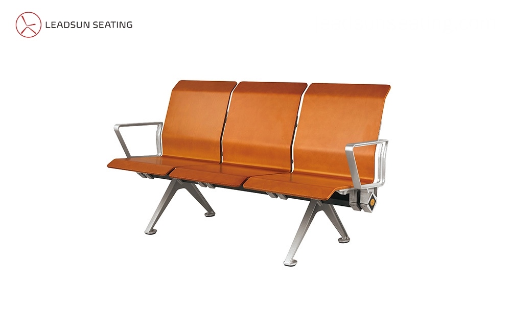 Wooden-Waiting-Chairs-LS-529M Three-seat waiting bench with orange leather upholstery and silver metal legs and arms.