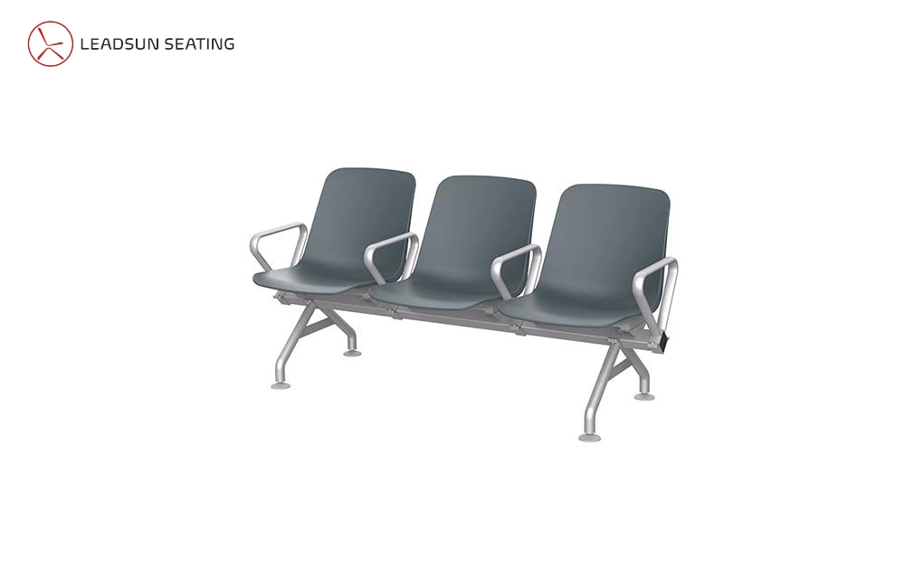 comfortable stainless steel waiting chair Three-seater waiting bench with dark gray seats and silver metal frame.