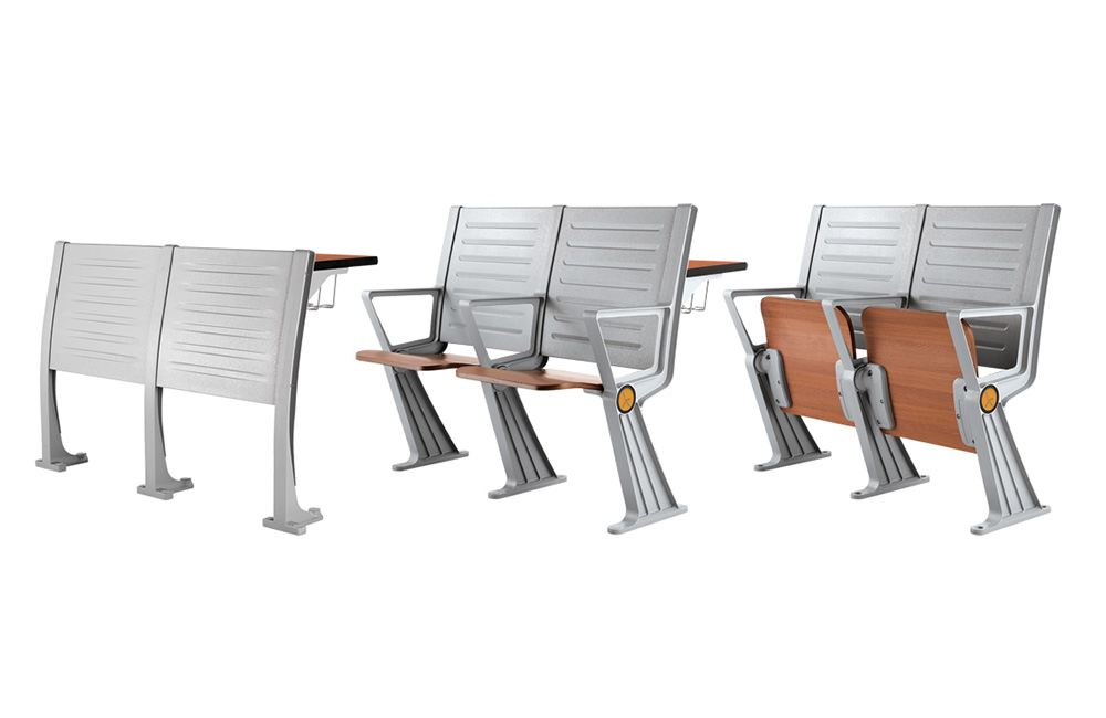 Two-seater lecture hall chairs with attached writing tablets and individual fold-up desks.