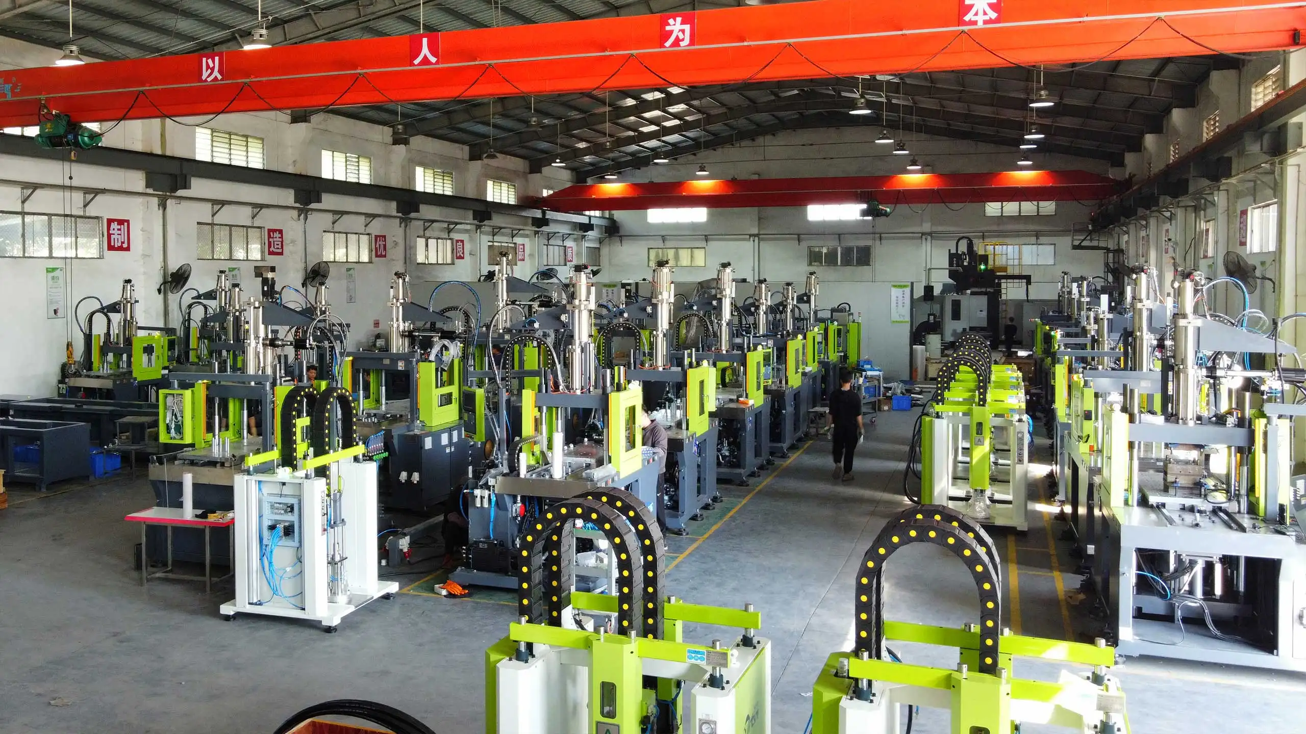 TYM LSR machine assembly area for silicone production solutions - TYM