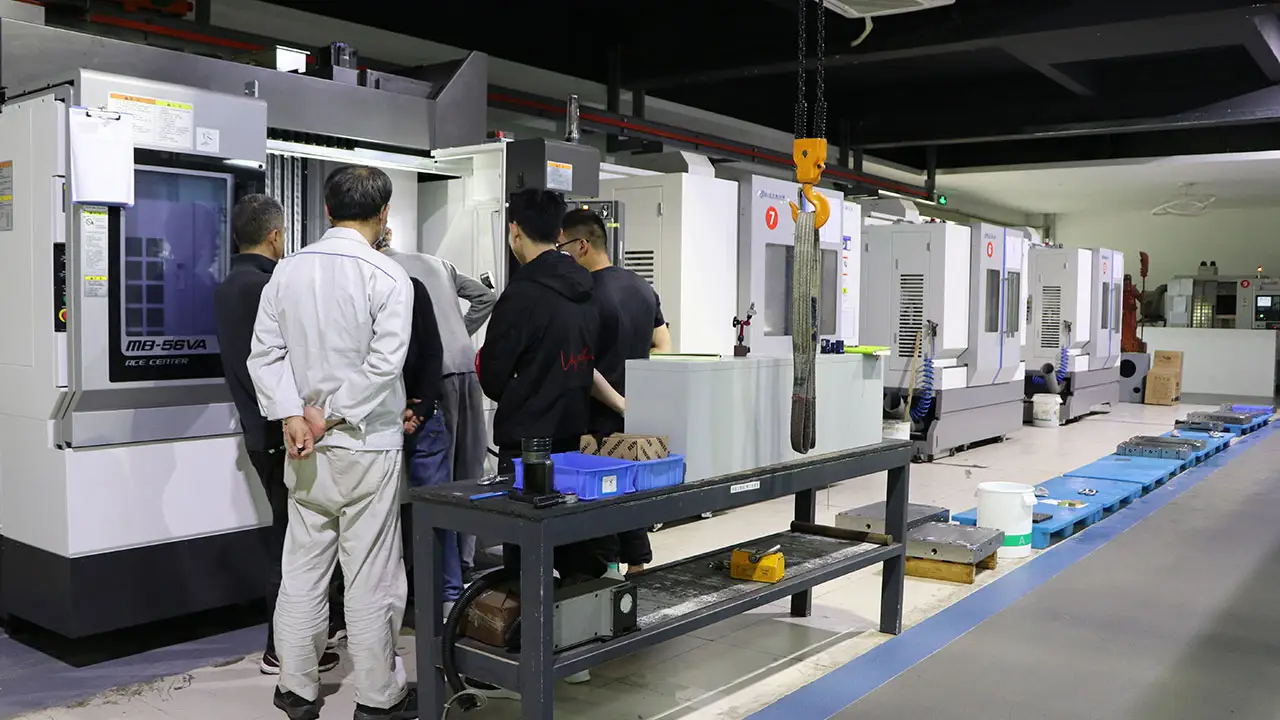 TYM engineers providing technical support for LSR injection molding equipment and production setup - TYM