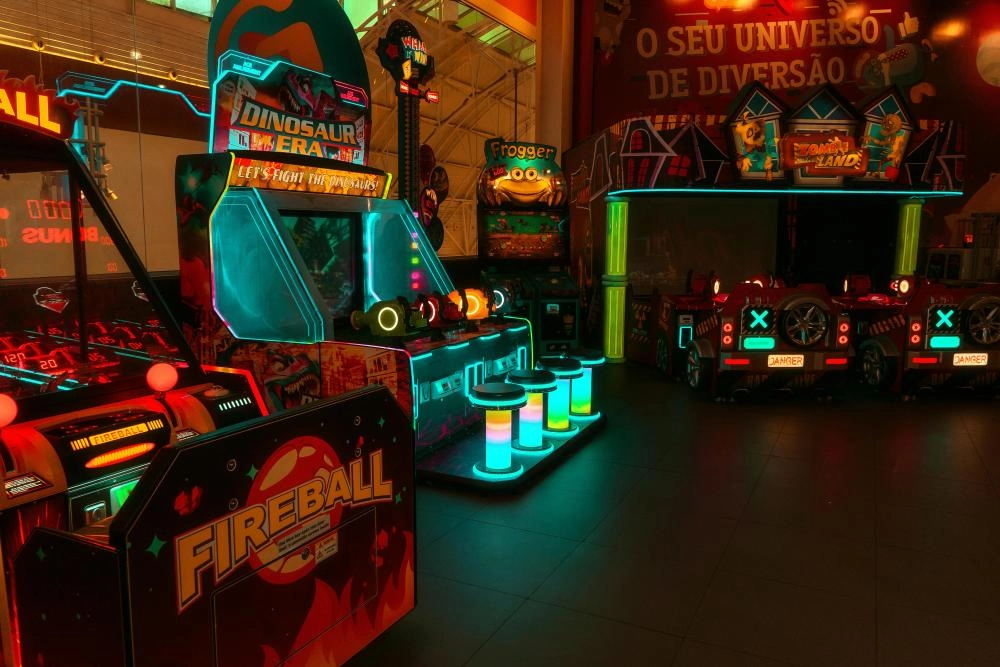 arcade-game-consoles - VRN0.1 Brightly lit arcade game consoles in a fun, vibrant setting. - VRN0.1