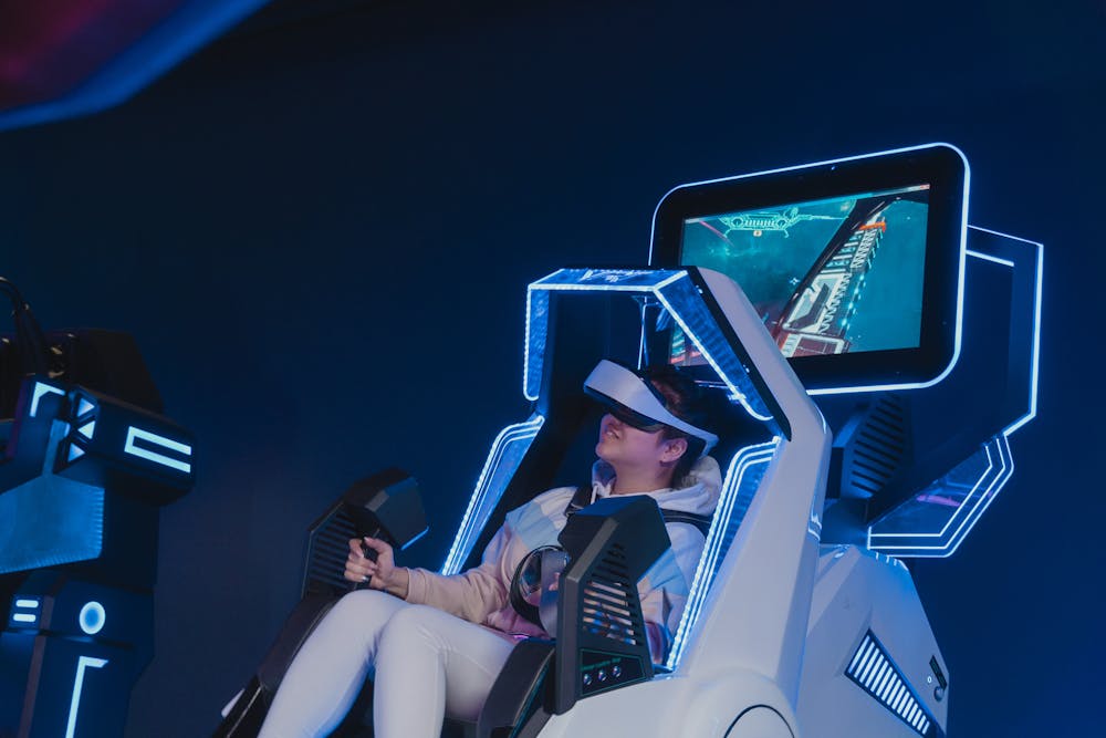 Girl using a 360 VR Motion Simulator.