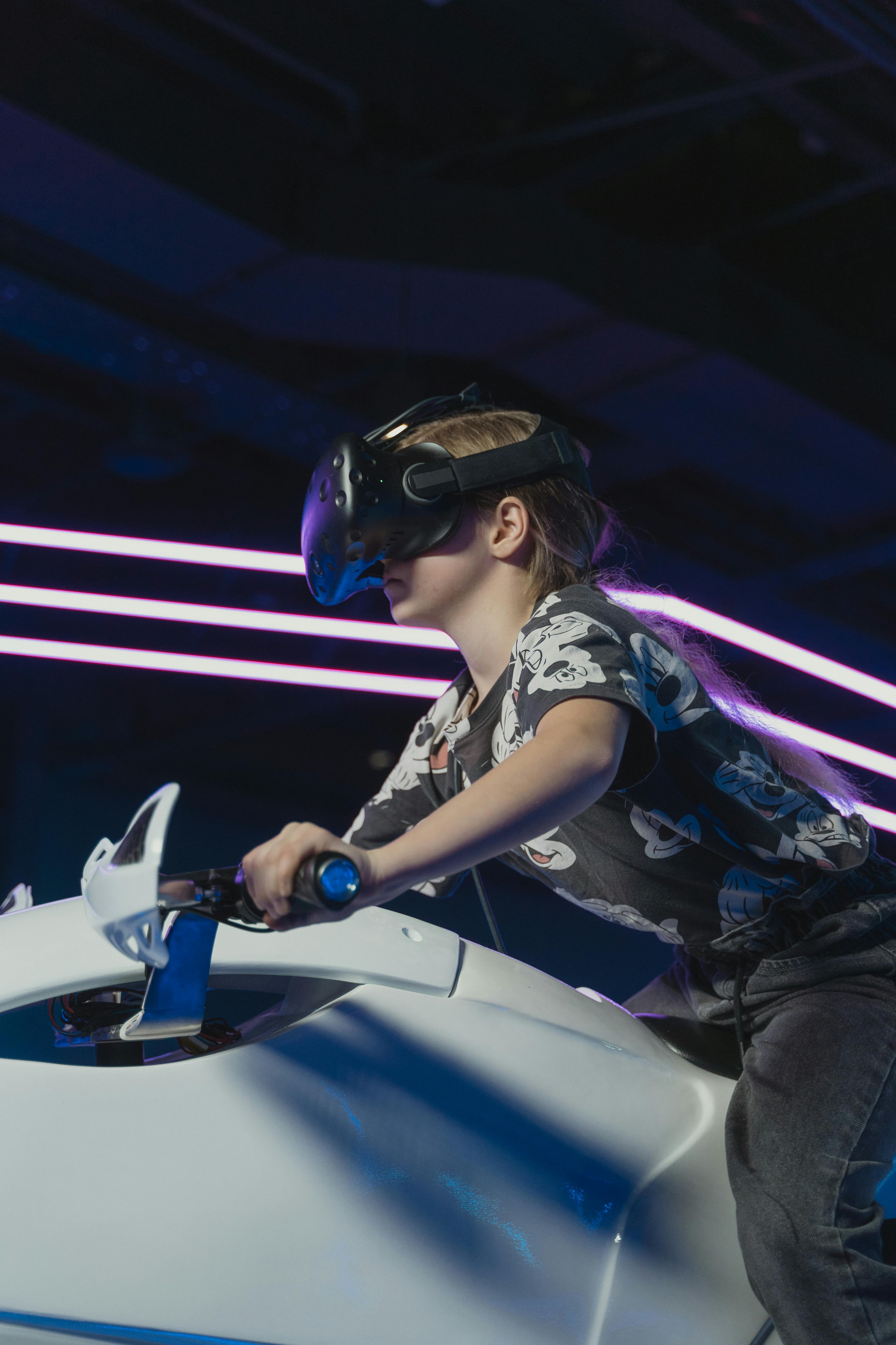 Young child enjoying an immersive virtual reality game indoors_