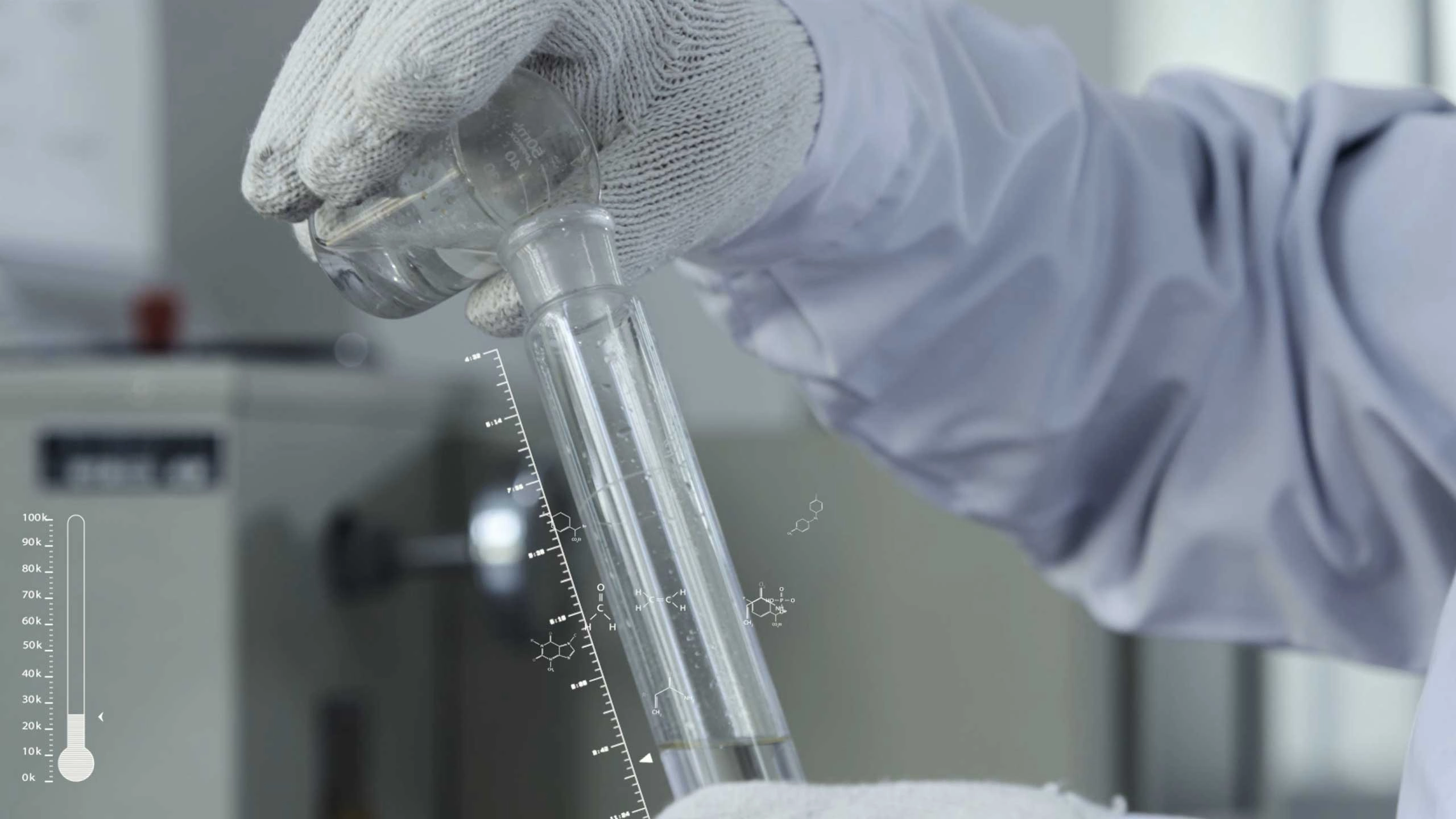 Scientist pouring liquid from a beaker into a test tube in a lab. - KINGDELI