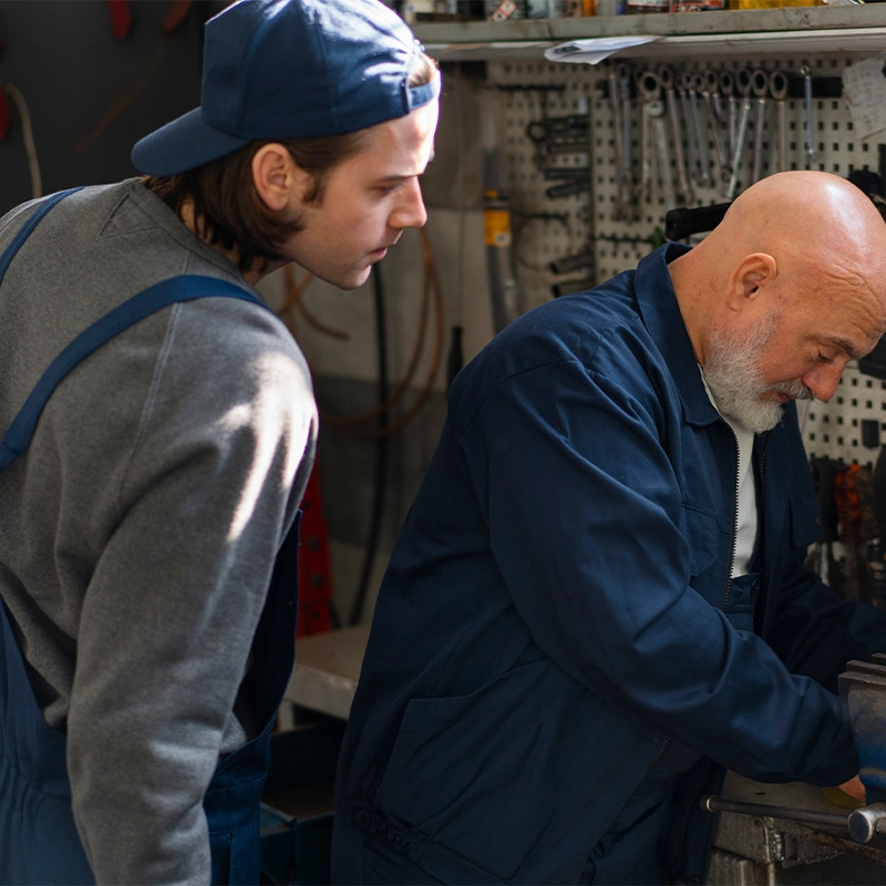 male-car-mechanic-working-car-repair-shop - Senkelly