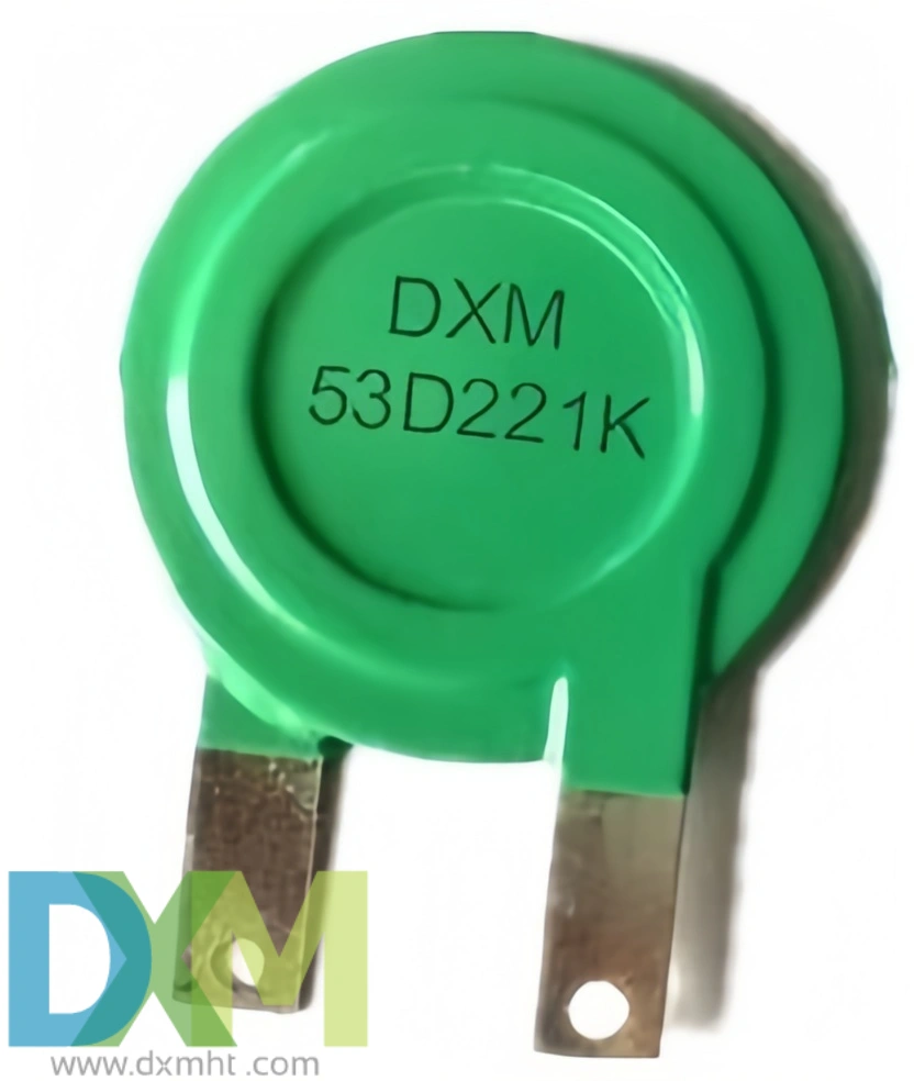 Green disk varistor with the model number 53D221K printed on it.  The varistor has two leads for connection.