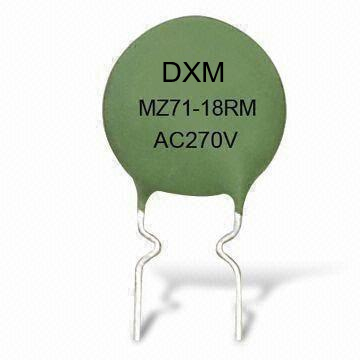 Close-up of a green DXM MZ71-18RM AC270V degaussing TV resistor.  This degausser component is used in television sets.