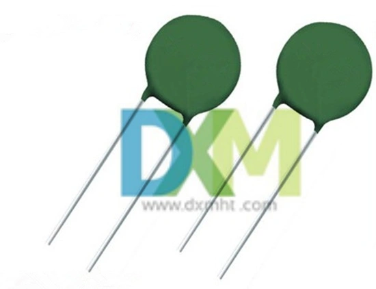 Two Temperature Coefficient NTC Thermistors,with round green bodies and metal leads.