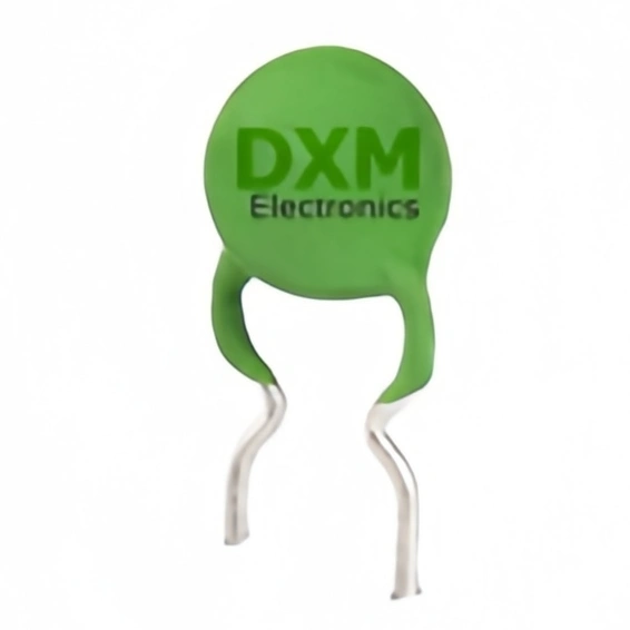 A green, round ptc thermistor with two leads, labeled "DXM Electronics." This is an example of what is positive temperature coefficient thermistor, which means its resistance increases as temperature rises.