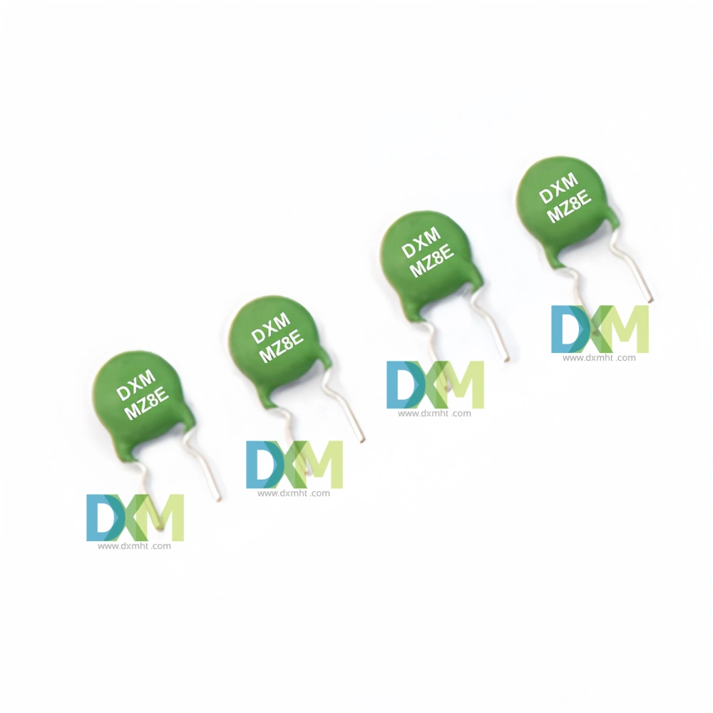 Four green PTC Transformer overvoltage protection-MZ8E components on a white background.