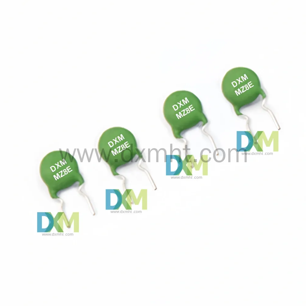 PTC Transformer-MZ8E - DXM Four green PTC Transformer overvoltage protection-MZ8E components on a white background. - DXM