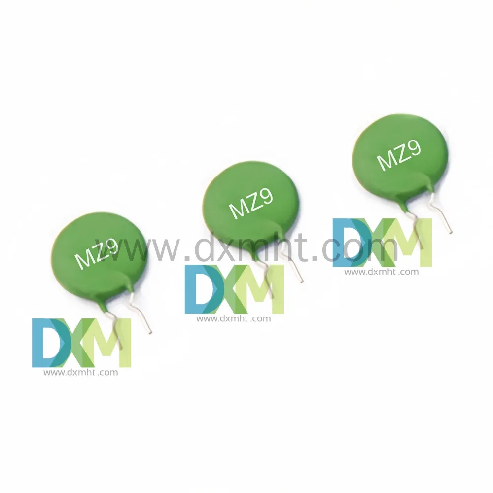 PTC Ceramic - MZ9 thermistors - DXM Three PTC Ceramic - MZ9 thermistors with leads and the logo of the DXM manufacturer. - DXM