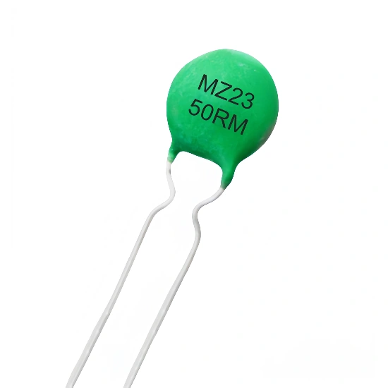 Green Element PTC thermistor with white leads. The thermistor is labeled "MZ23 50RM".