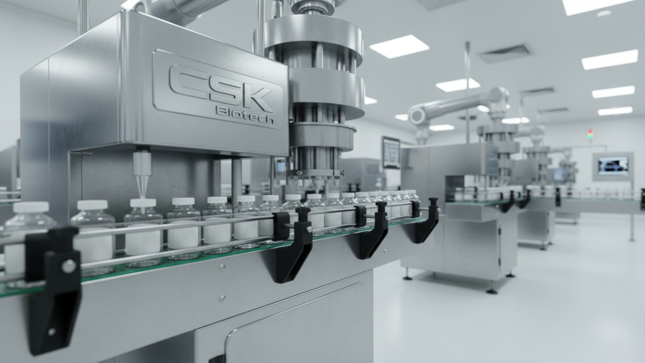 A professional manufacturing facility with high tech machinery and the brand name CSK Biotech visible on the industrial equipment.