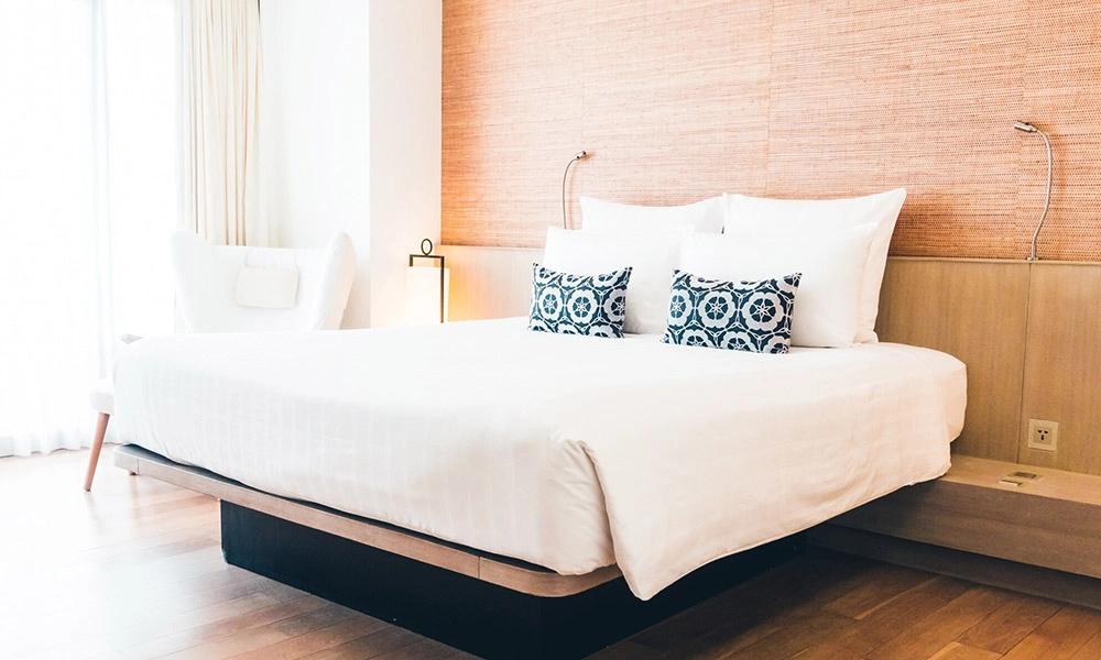 double-bed-with-pillows_1203-117 double-bed-with-pillows_1203-117