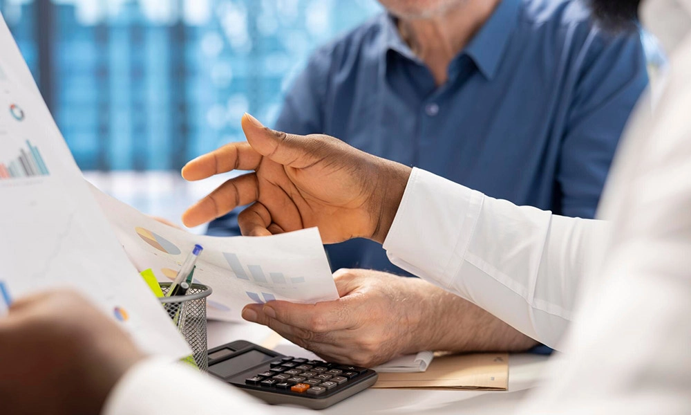 senior-people-consulting-with-their-financial-banker-about-retirement-plans_482257-95215