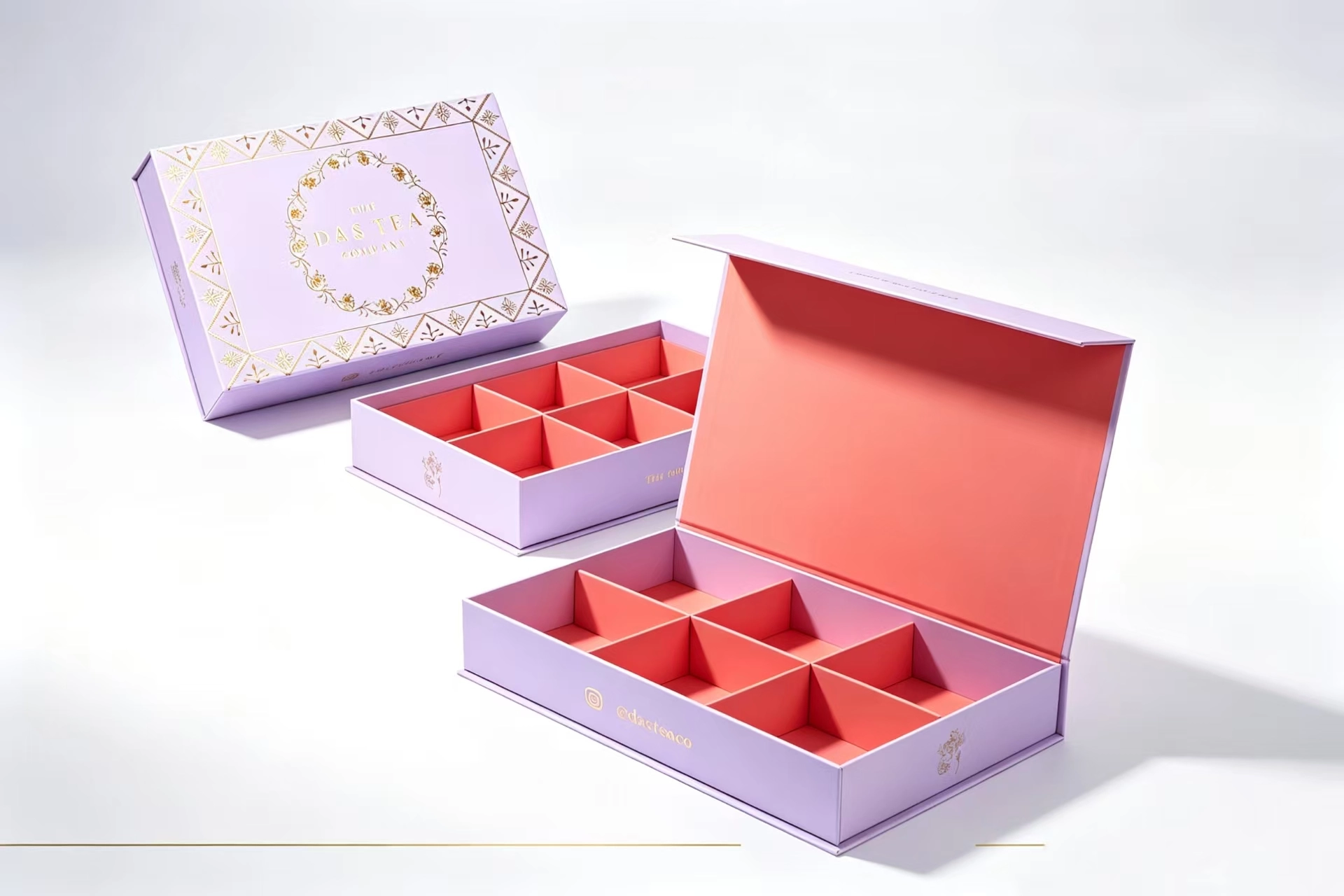 Elegant lavender and gold tea gift boxes with divided coral interiors. - Yifeng Packaging