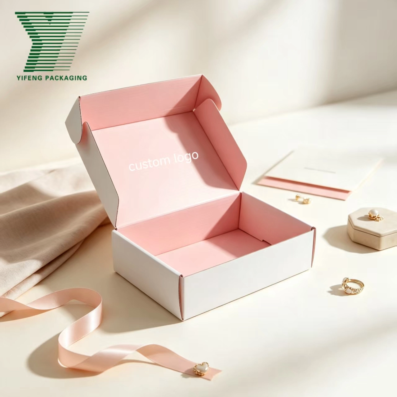 Open white mailing box with pink interior and custom logo placeholder. - Yifeng Packaging