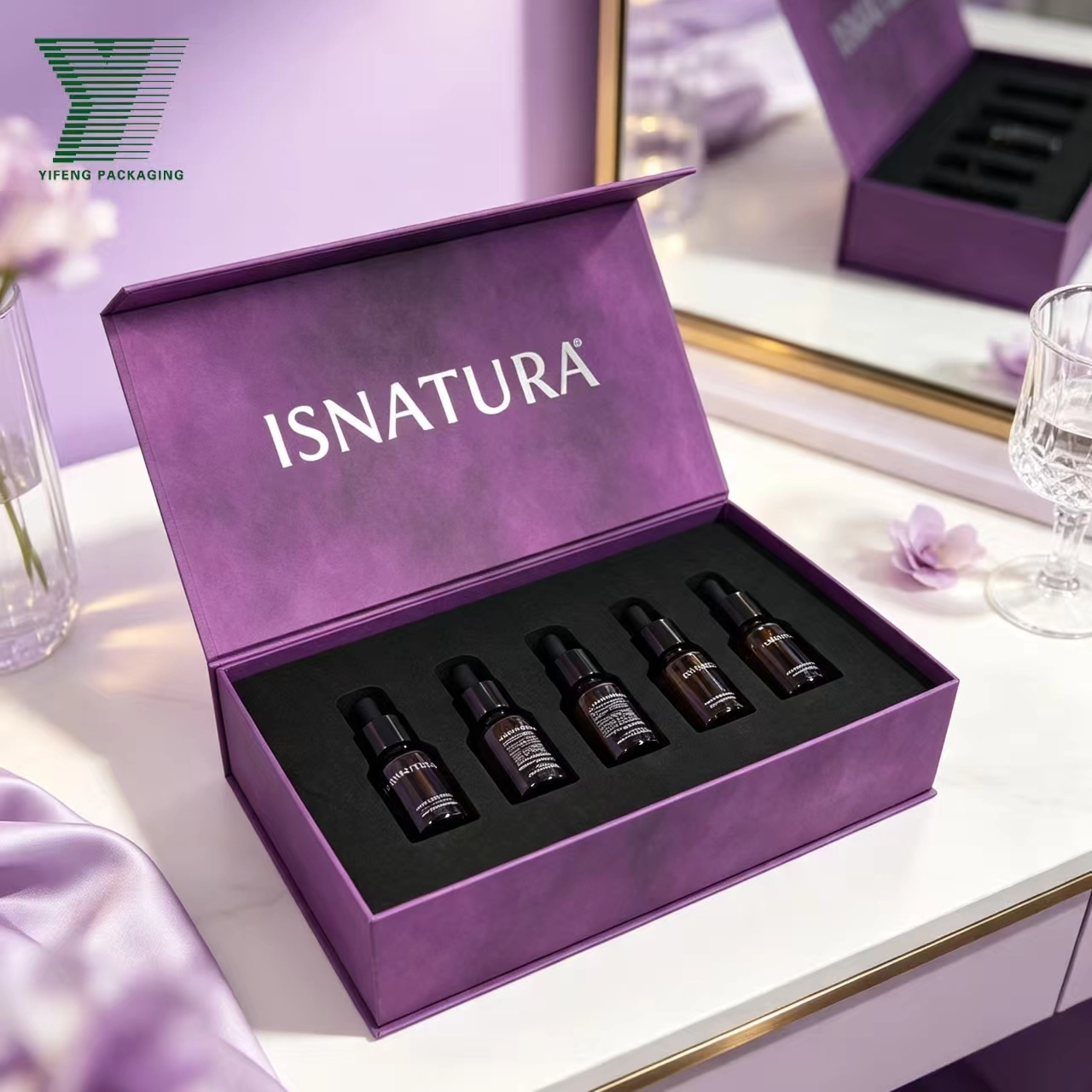 Purple ISNATURA gift box with five small amber glass dropper bottles. - Yifeng Packaging